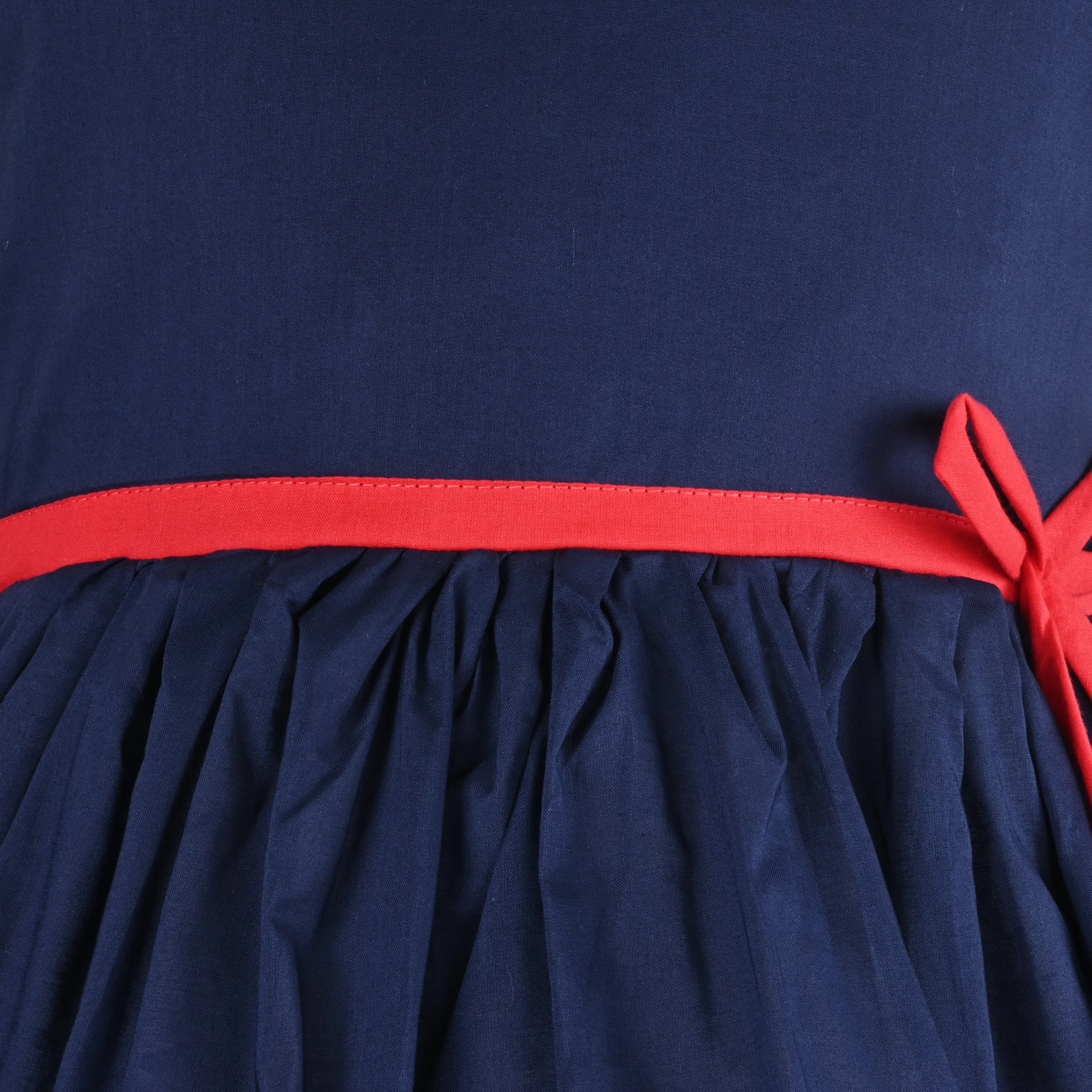 Baby Girls Dark Blue Bodice Dress/Red Ribbon Waist
